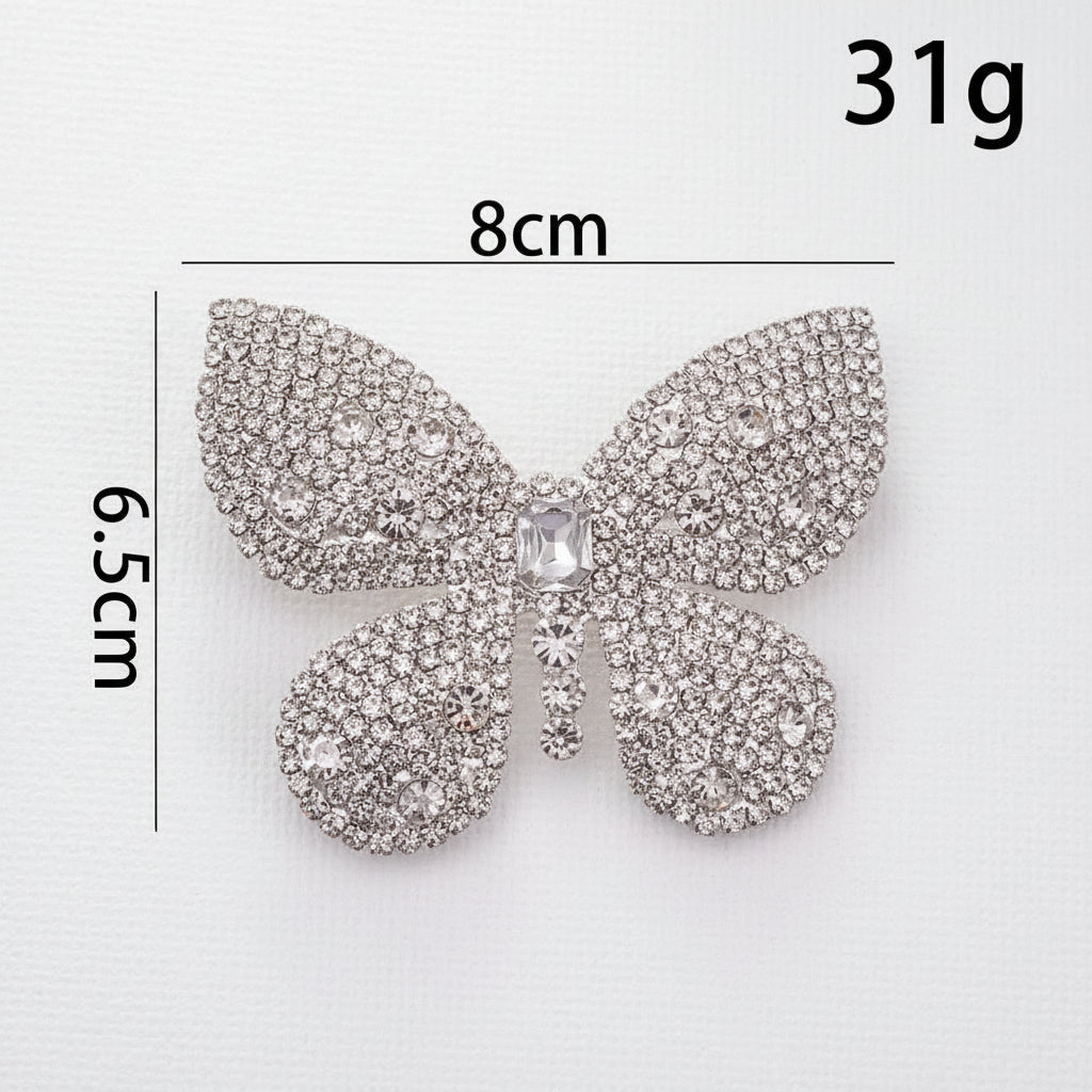 Butterfly-shaped decorative item with measurements and weight on a white background
