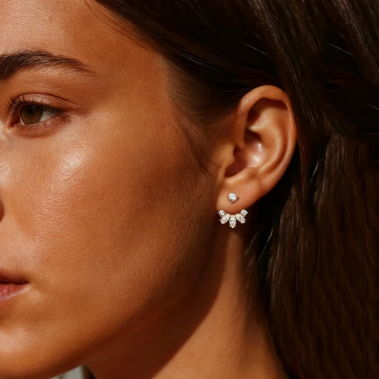 Close-up of a woman's ear with a diamond earring