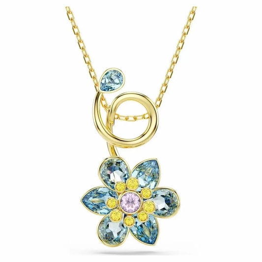 Gold necklace with a flower-shaped pendant featuring blue and pink gemstones on a white background